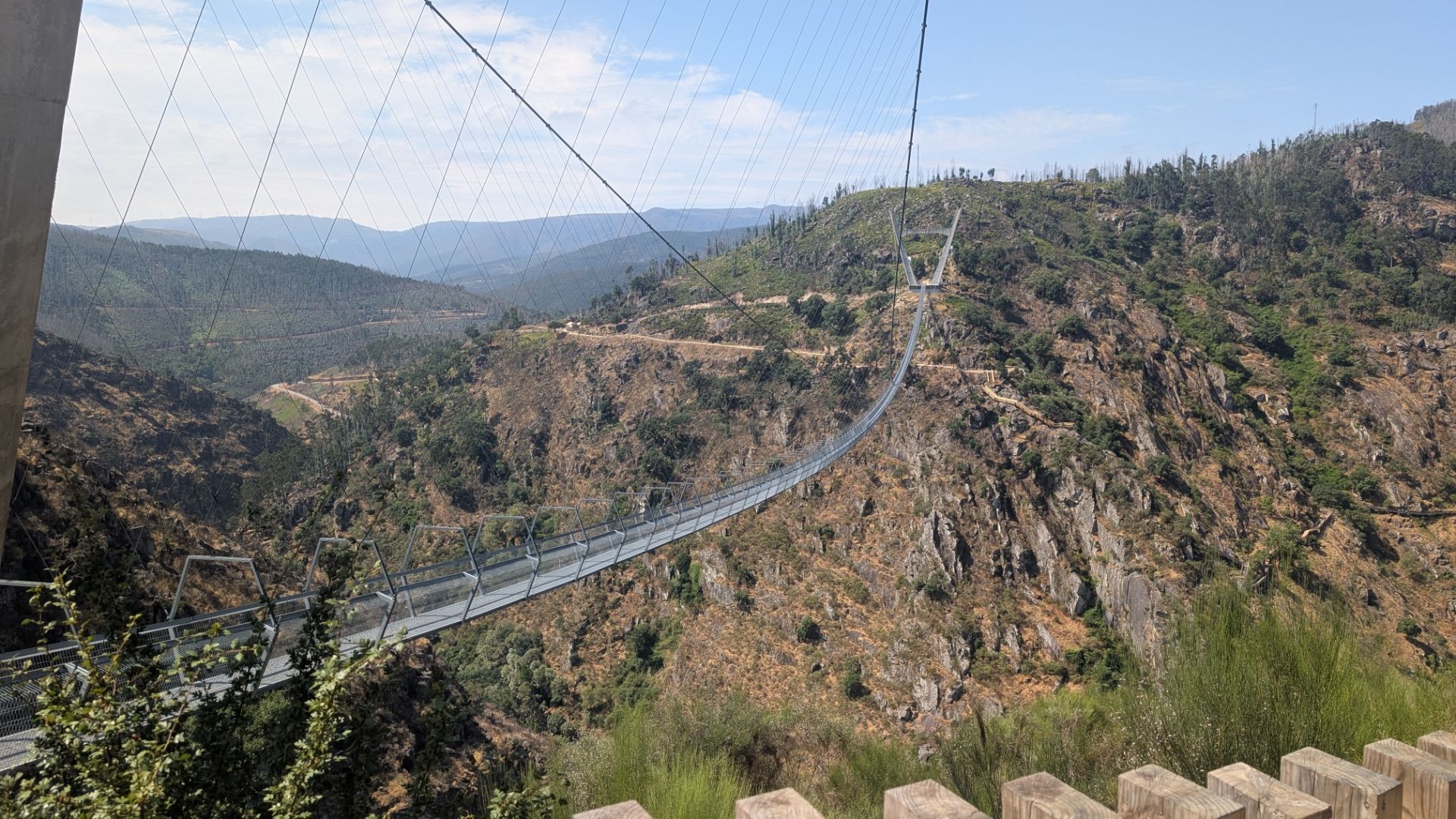 Very long steel suspension bridge over a gorge in Portugal