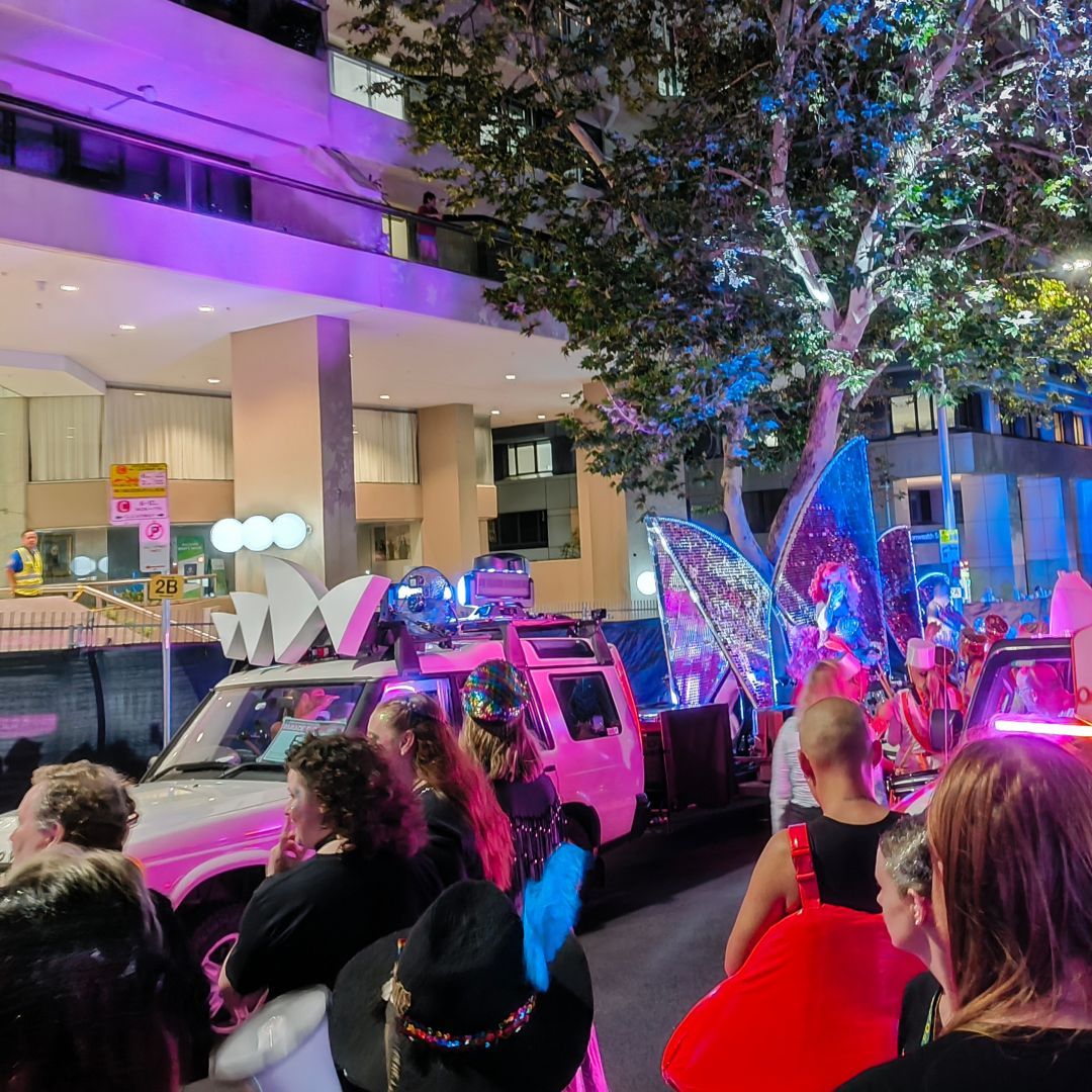 The fancy Sydney Opera House float made with a lot of cool foam and neon, with bonus drag queen.